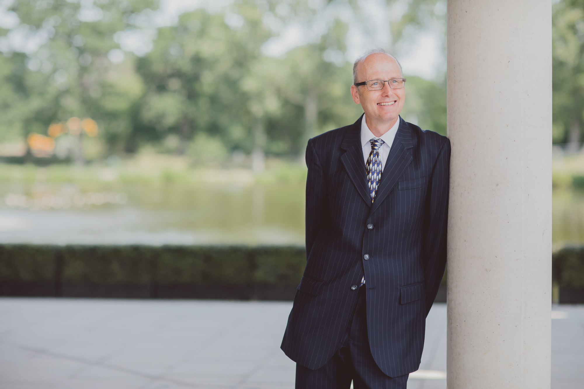 Graham Underwood leaning against a pillar and smiling